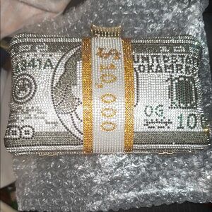 Gold and Silver Currency-Inspired Clutch with Shimmery Finish